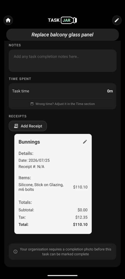 A scanned receipt on a task with the line items and tax pulled out
